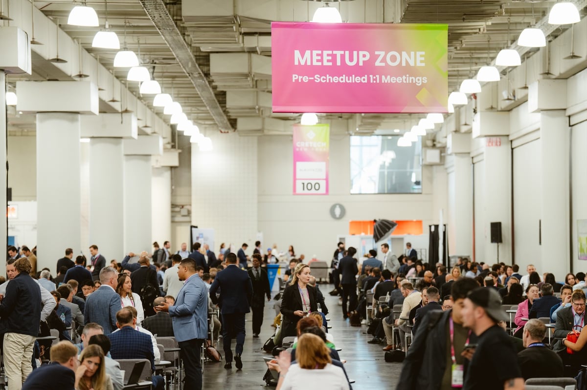The CREtech Meetup floor packed with one-to-one meetings