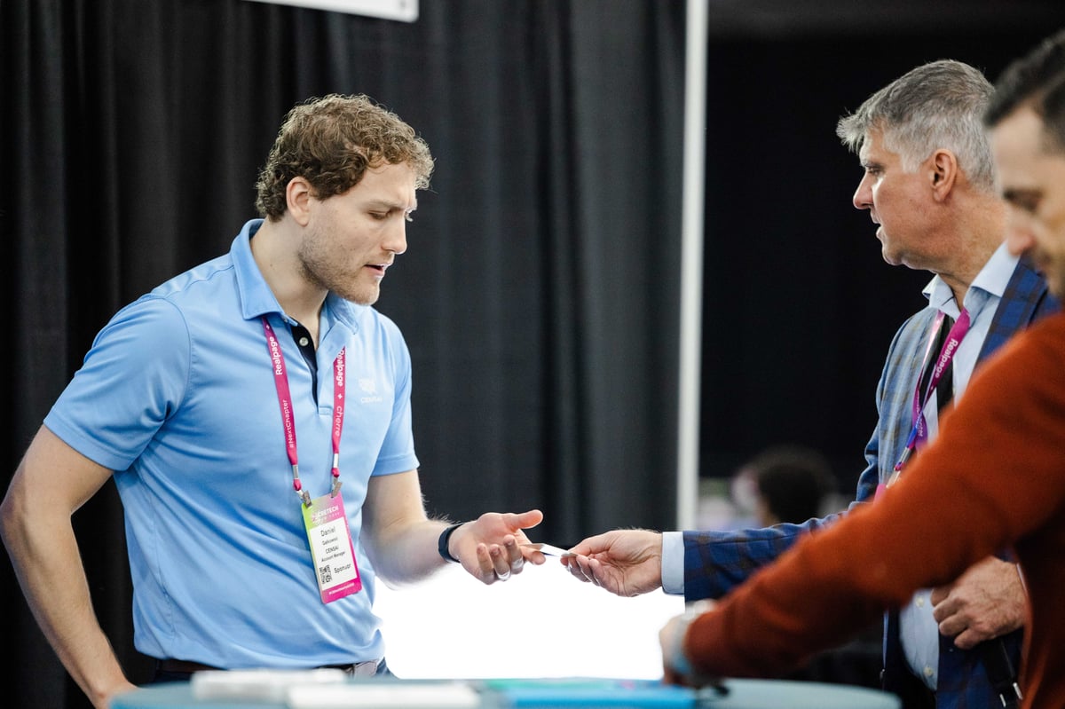 Attendees shaking hands after a meeting